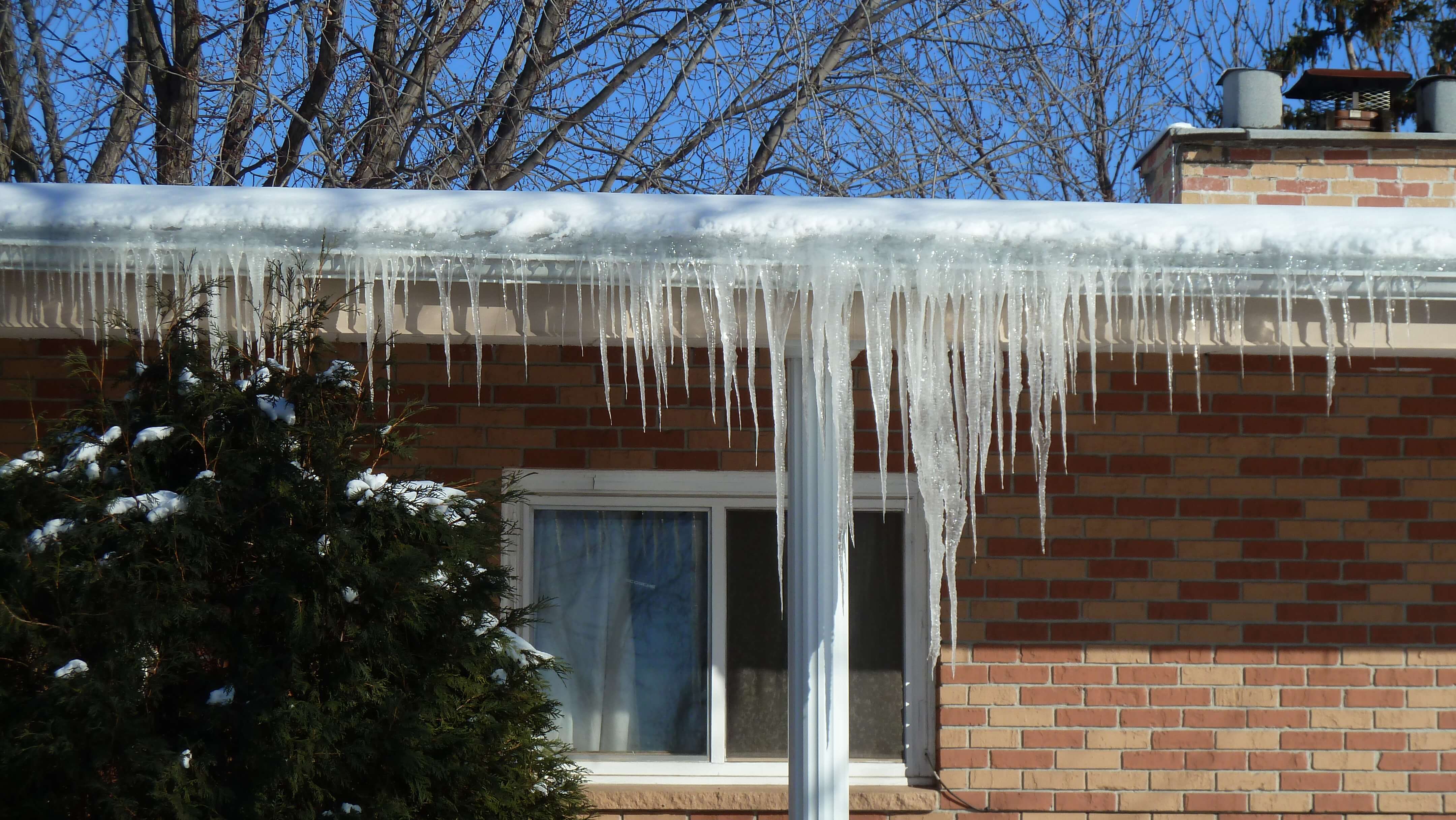 Big Icicles on home RTD Ice Dam Removal