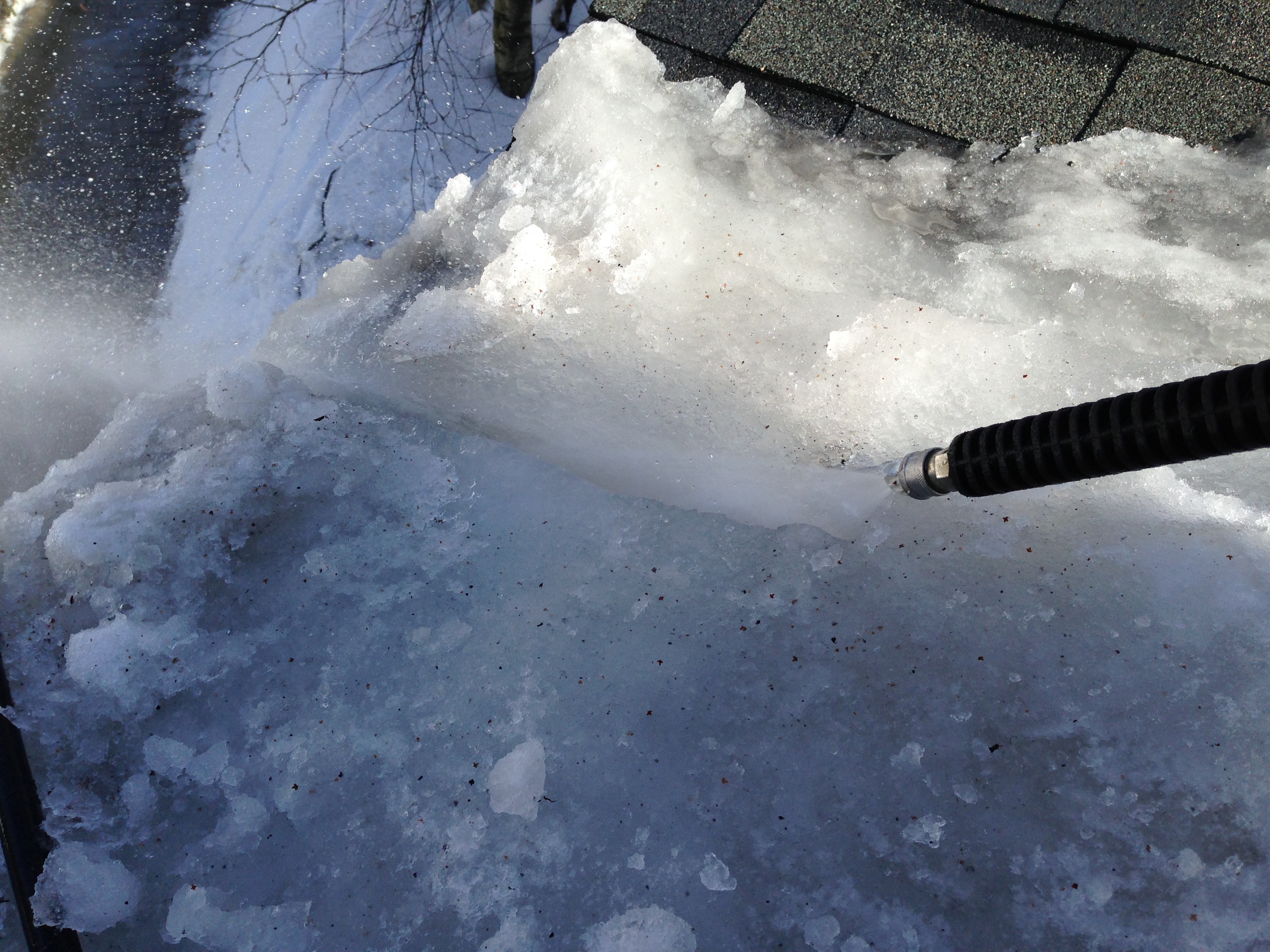 steam removal of an ice dam - call us 24 hours a day - roof to deck ice dam removal - minneapolis